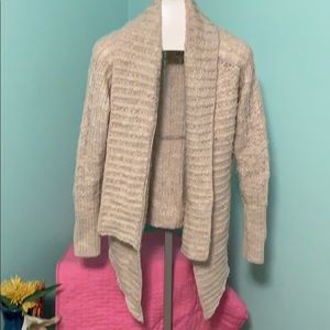 Cute oatmeal colored sweater to throw on and go!